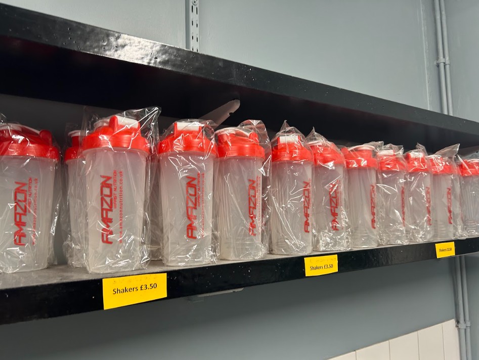Amazon Gym shakers on the reception shelf